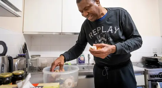 Resident preparing food
