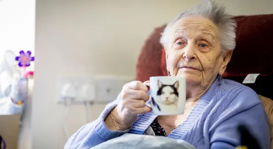 Resident Enjoying A Cup Of Tea